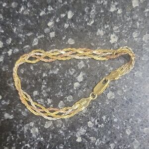 Elegant Gold and Silver Braided Bracelet